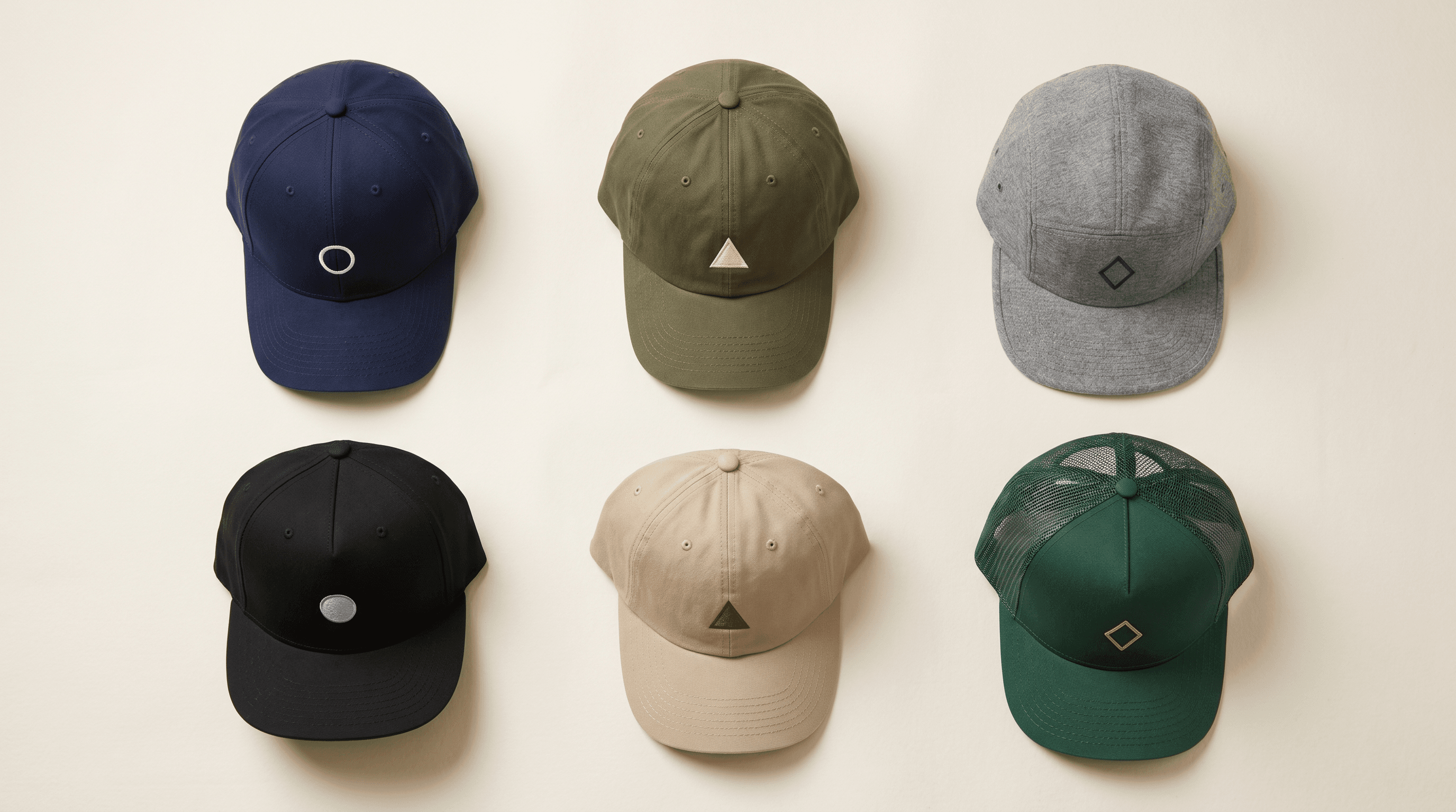 A curated arrangement of finished baseball caps made in Denver